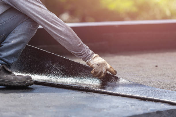Professional Interior Drainage System technician working in Jericho, NY